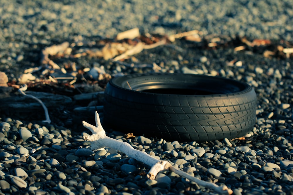 a tire laying on the ground next to a tire