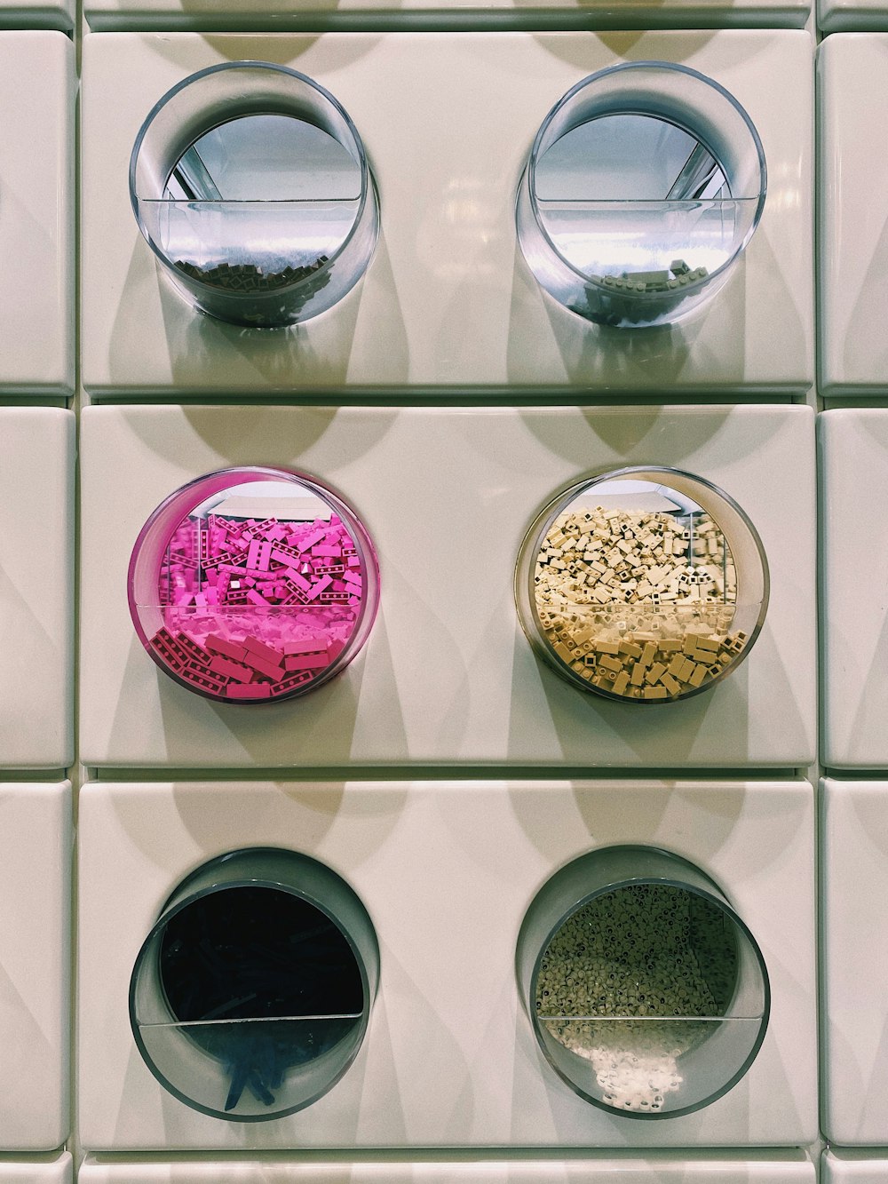 four bowls of different types of food on a wall