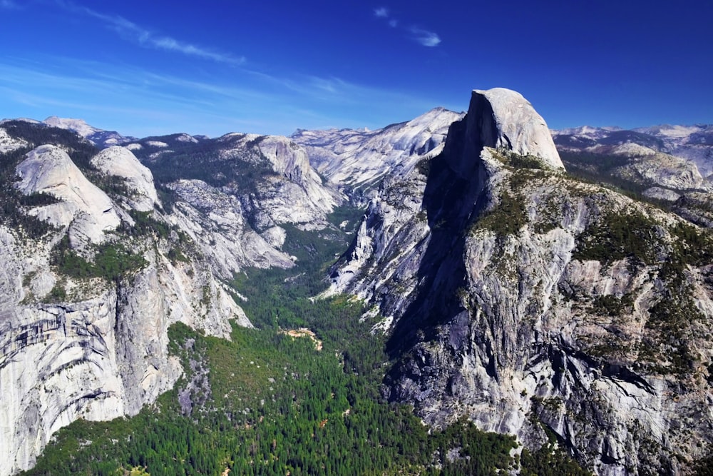 a view of the mountains from the top of a mountain