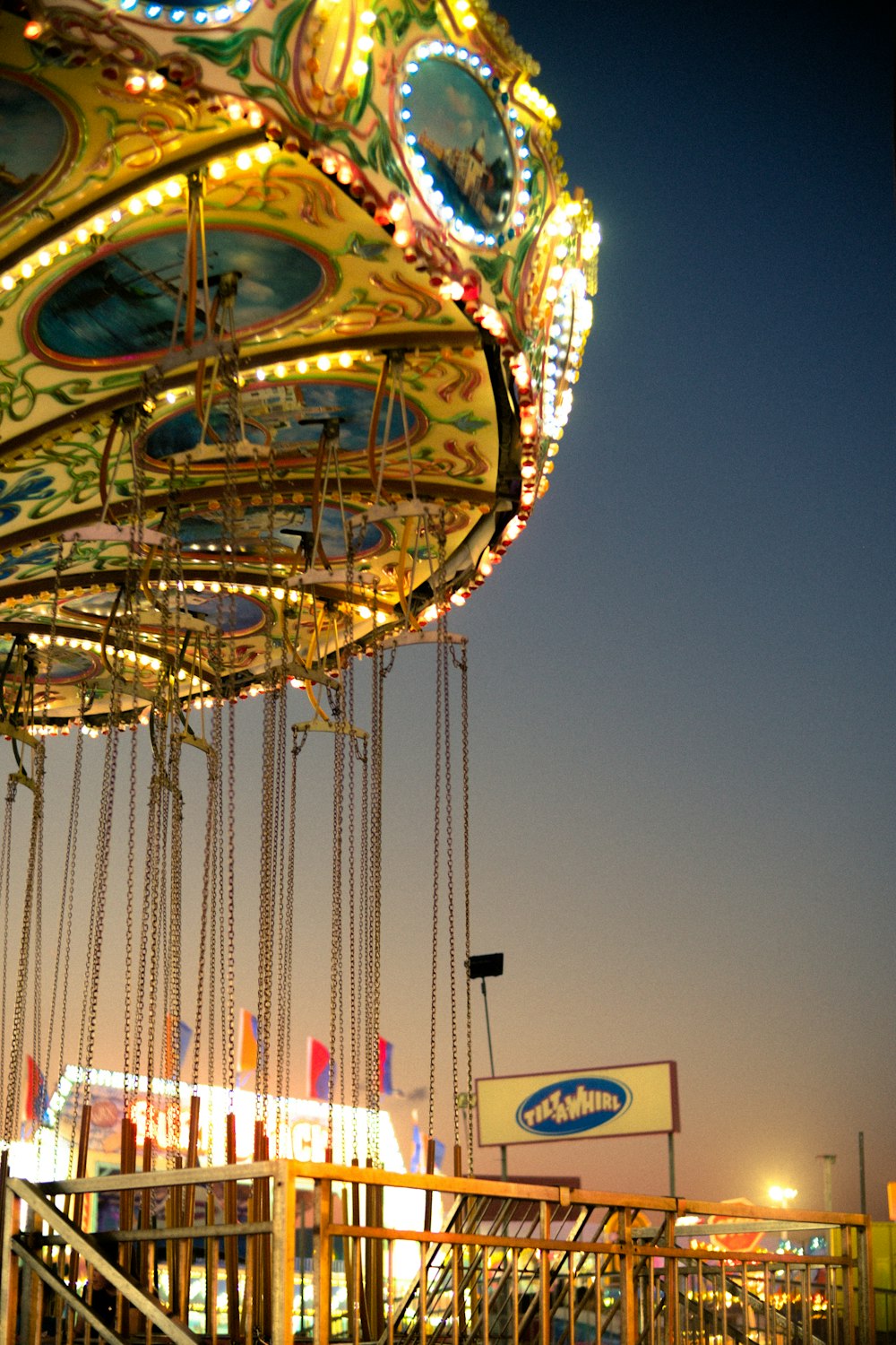 a merry go round at a carnival at night
