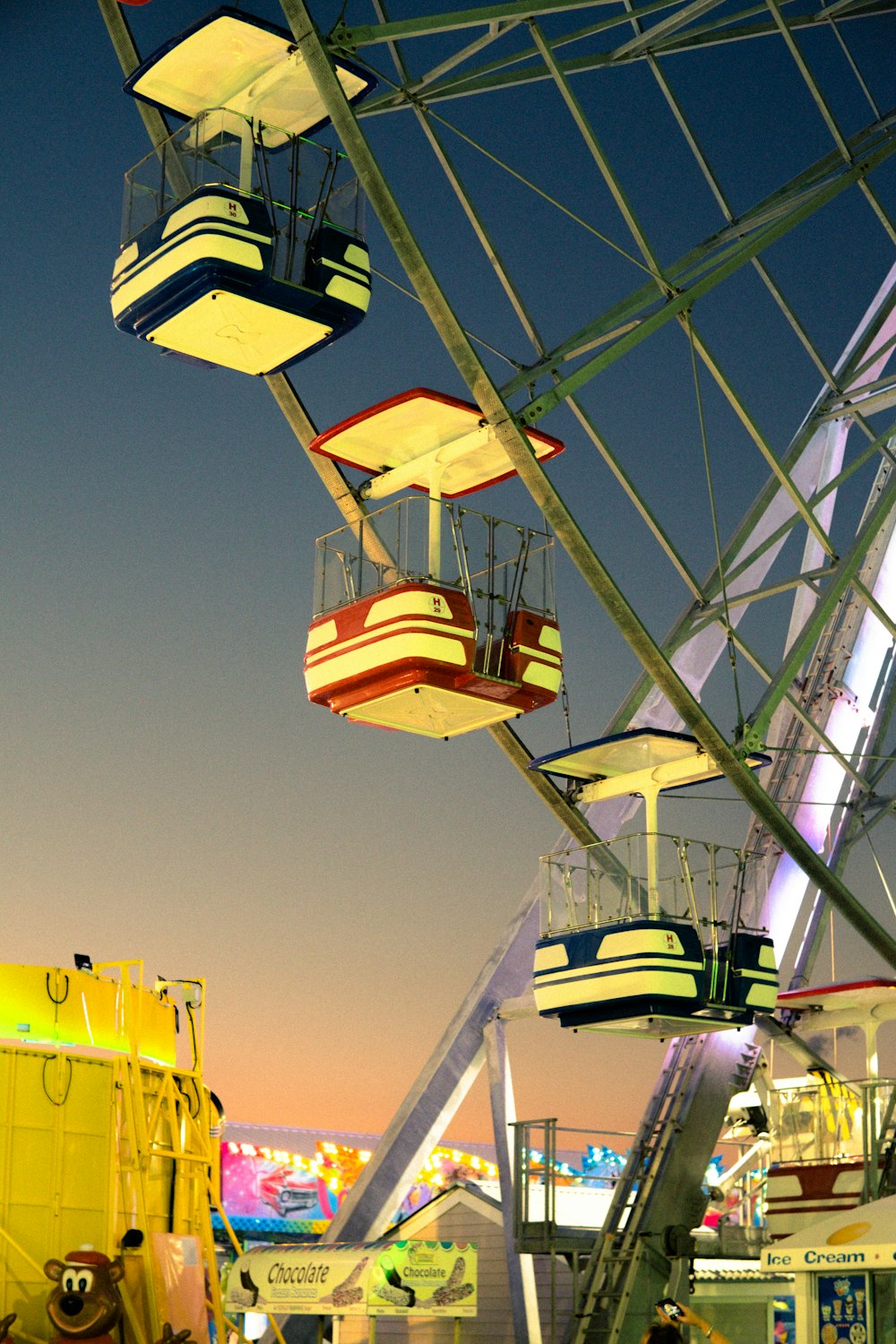 a ferris wheel at a carnival at night