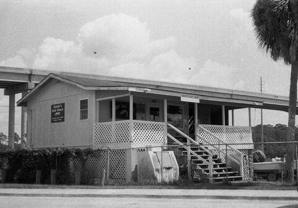 a black and white photo of a small building