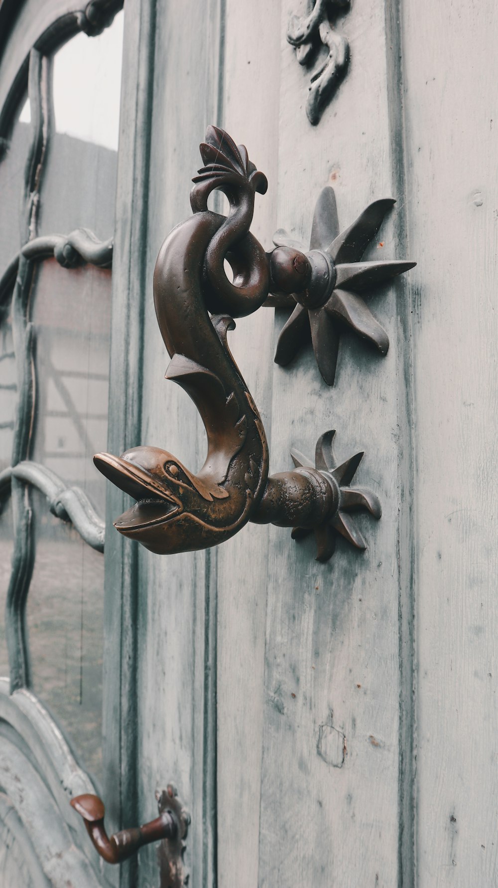a close up of a door handle on a building