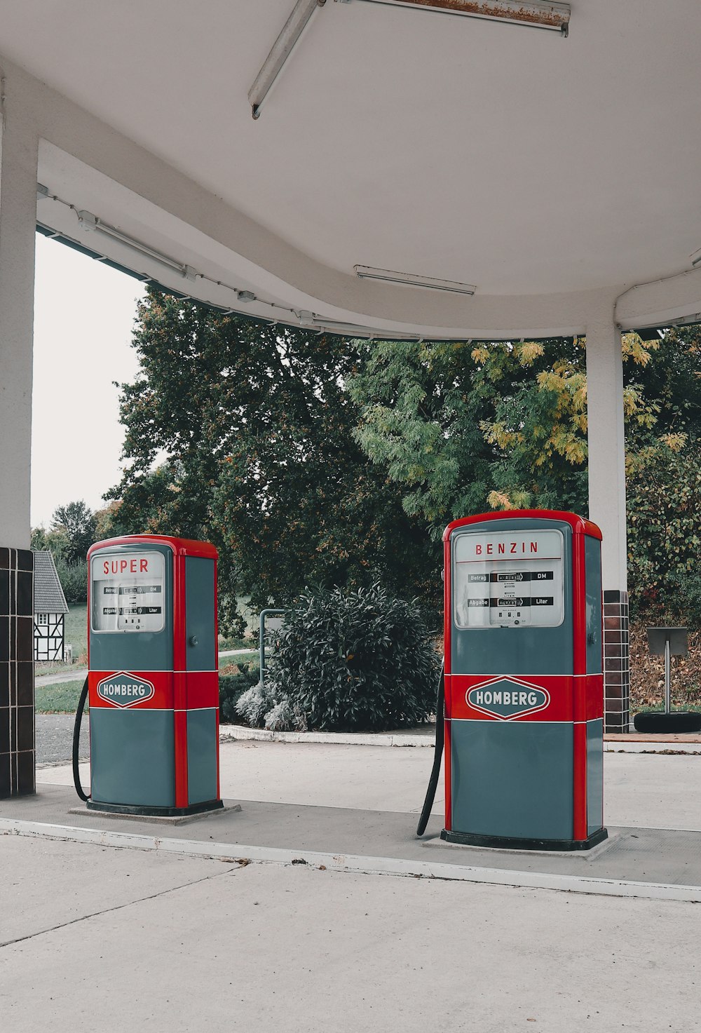 a couple of gas pumps sitting next to each other