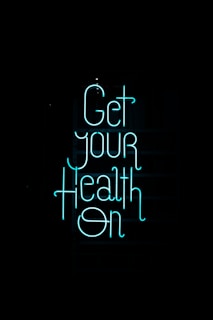 a neon sign that says get your health on