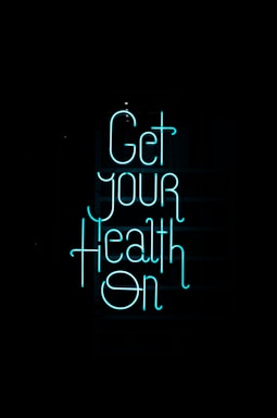 a neon sign that says get your health on