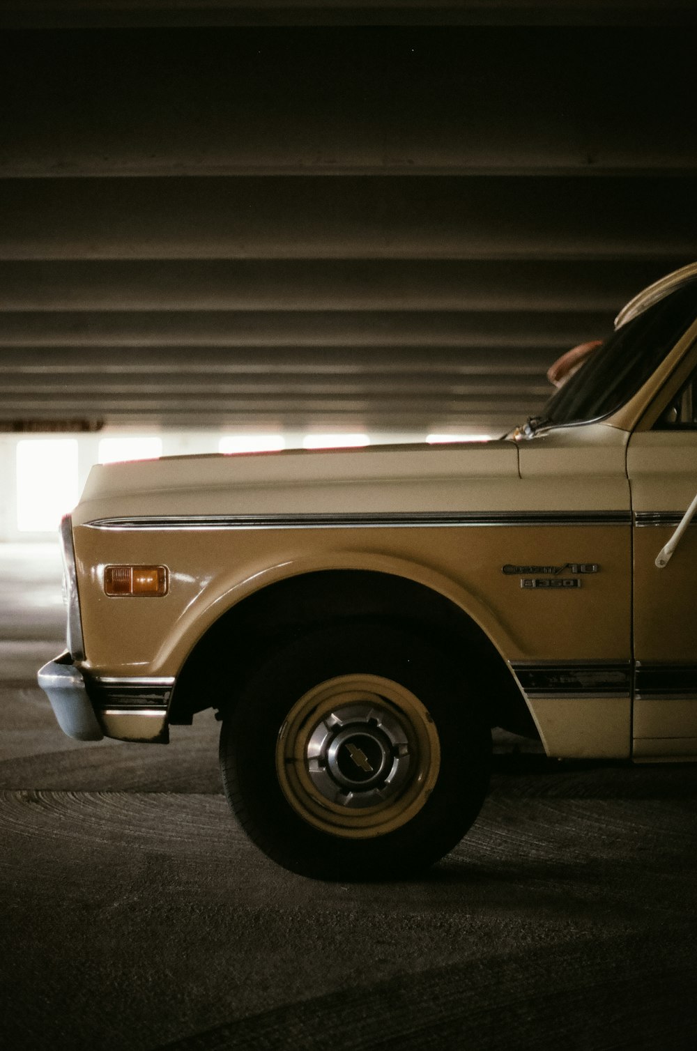 a truck is parked in front of a car