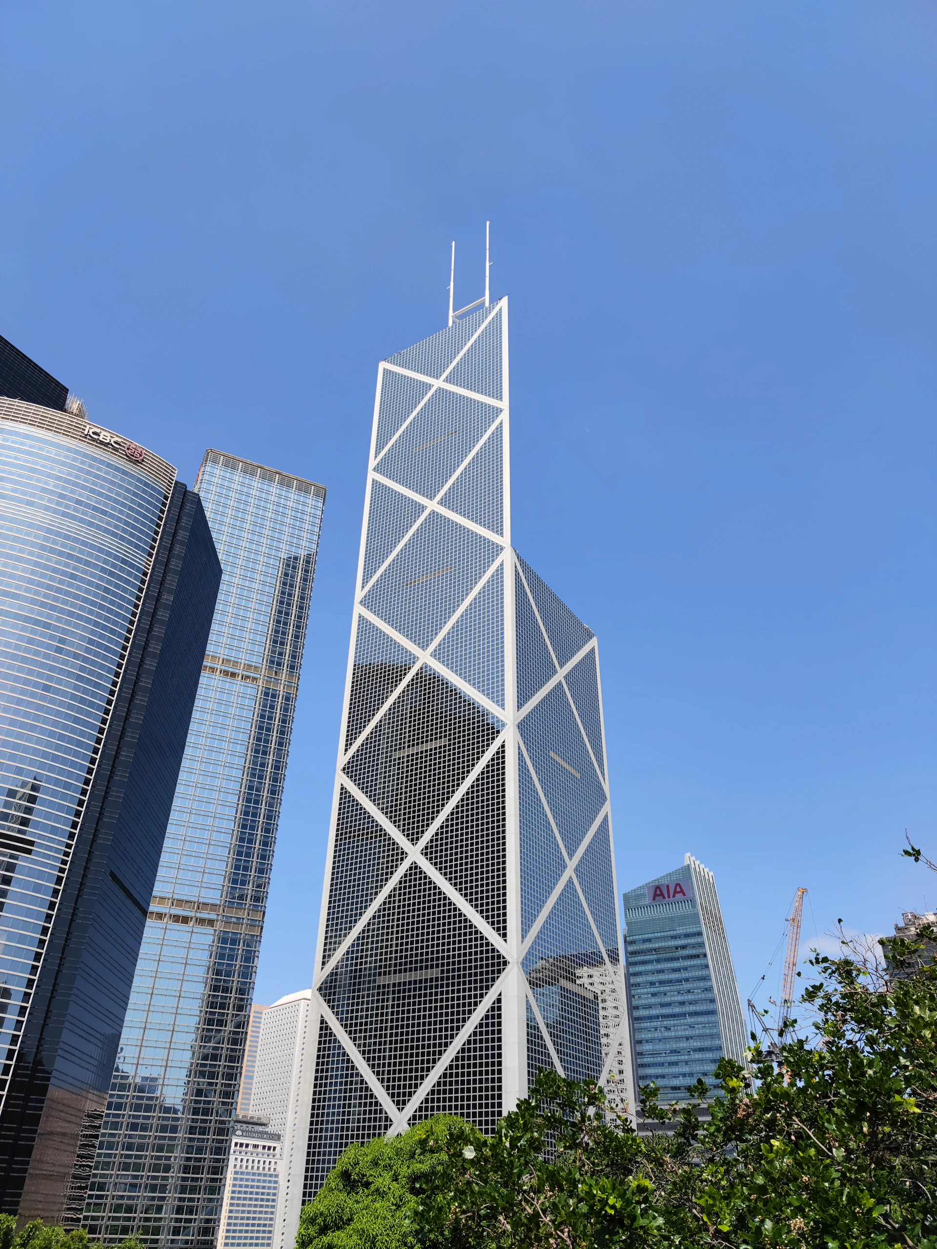 a very tall building towering over a city