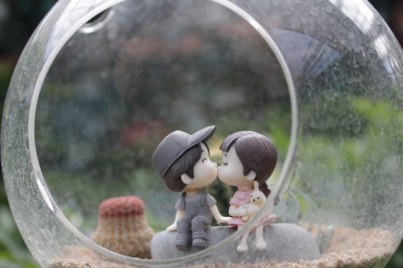 a glass ball with a couple inside of it