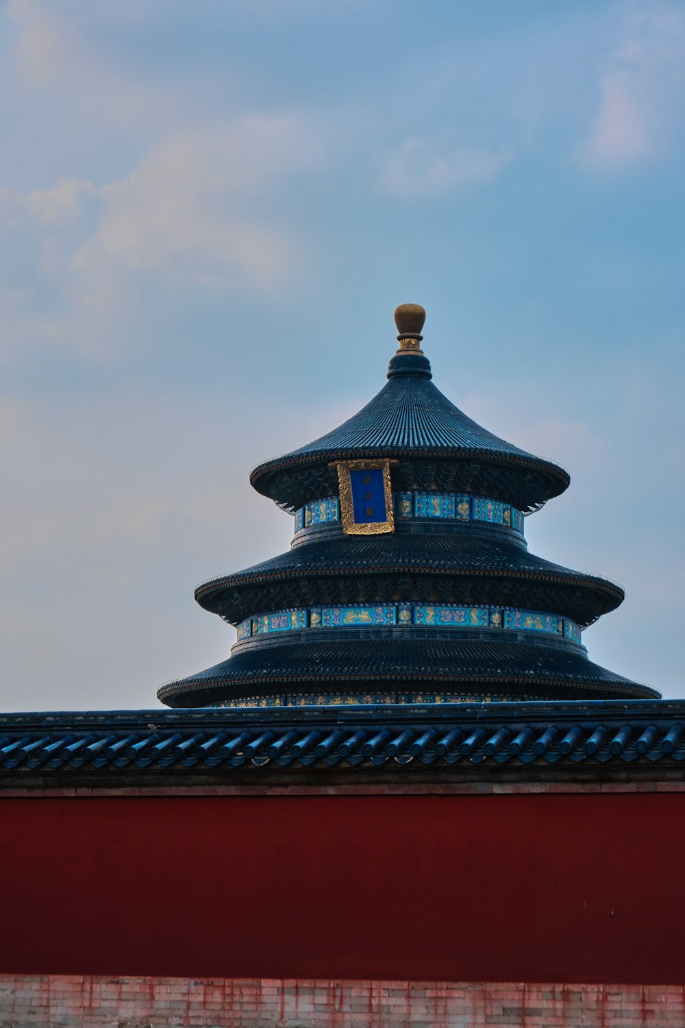 a tall building with a clock on top of it