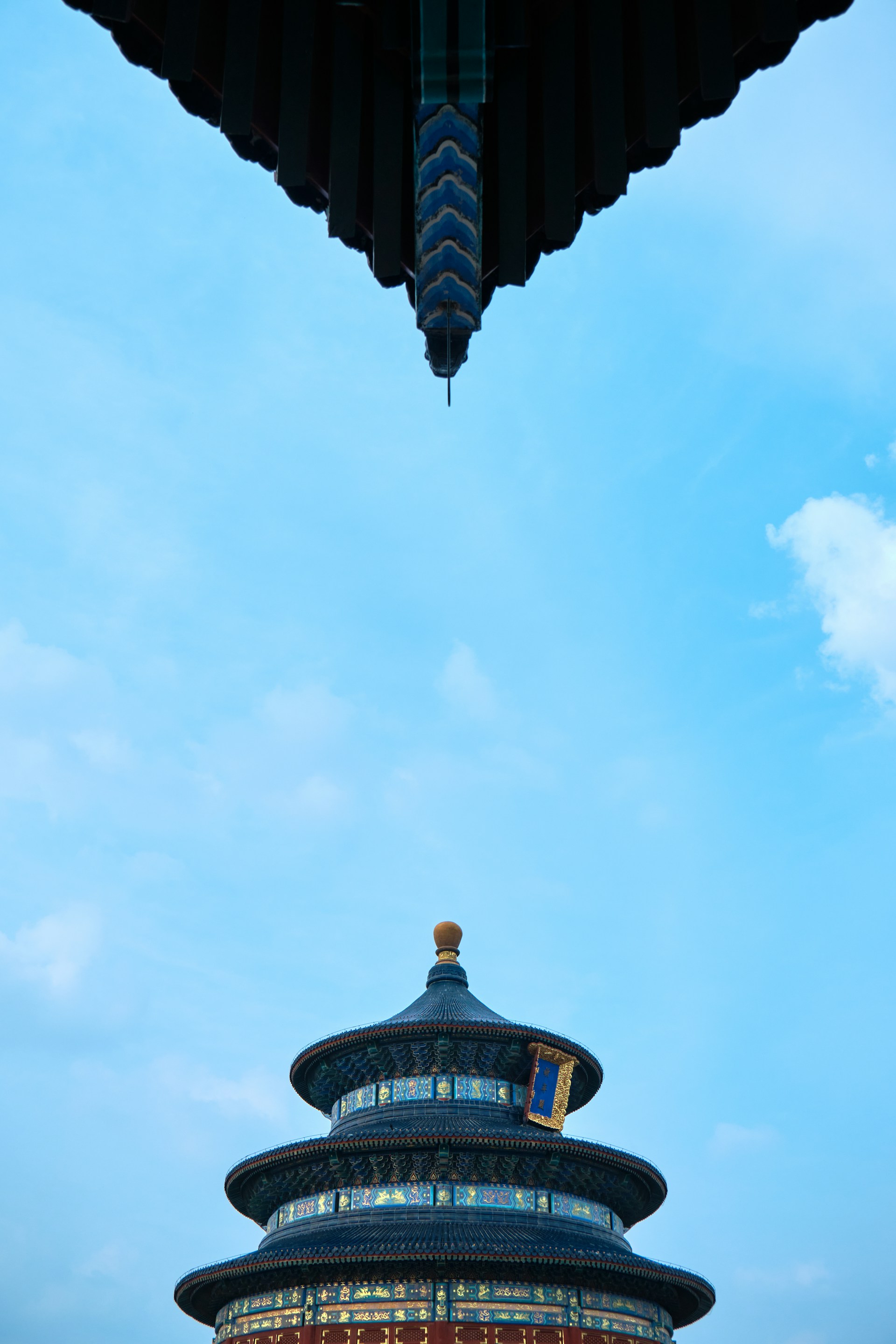 a tall building with a sky in the background