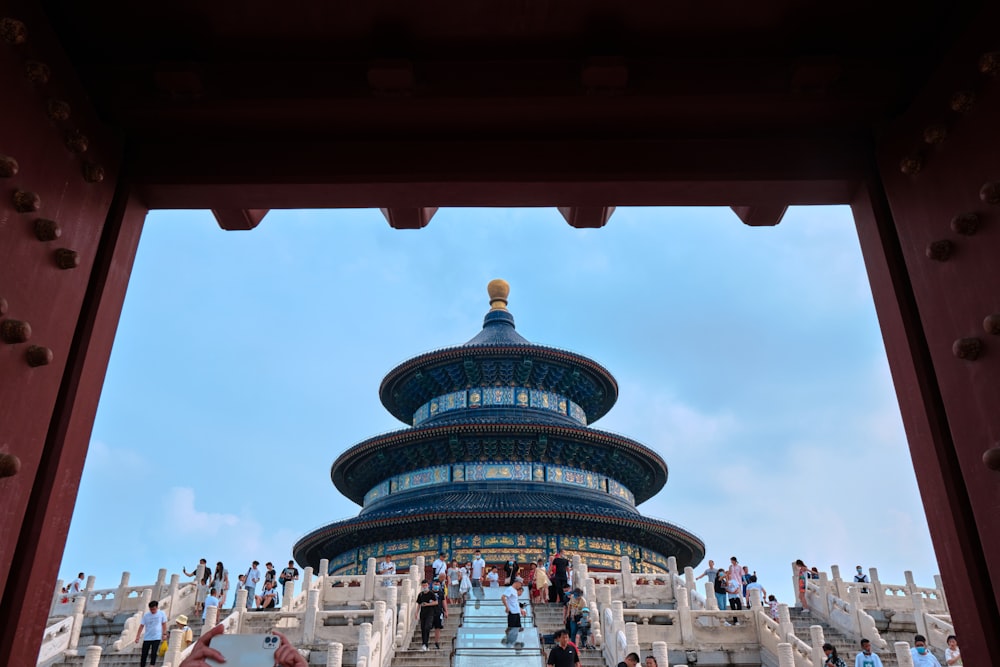 a group of people walking up and down a set of stairs