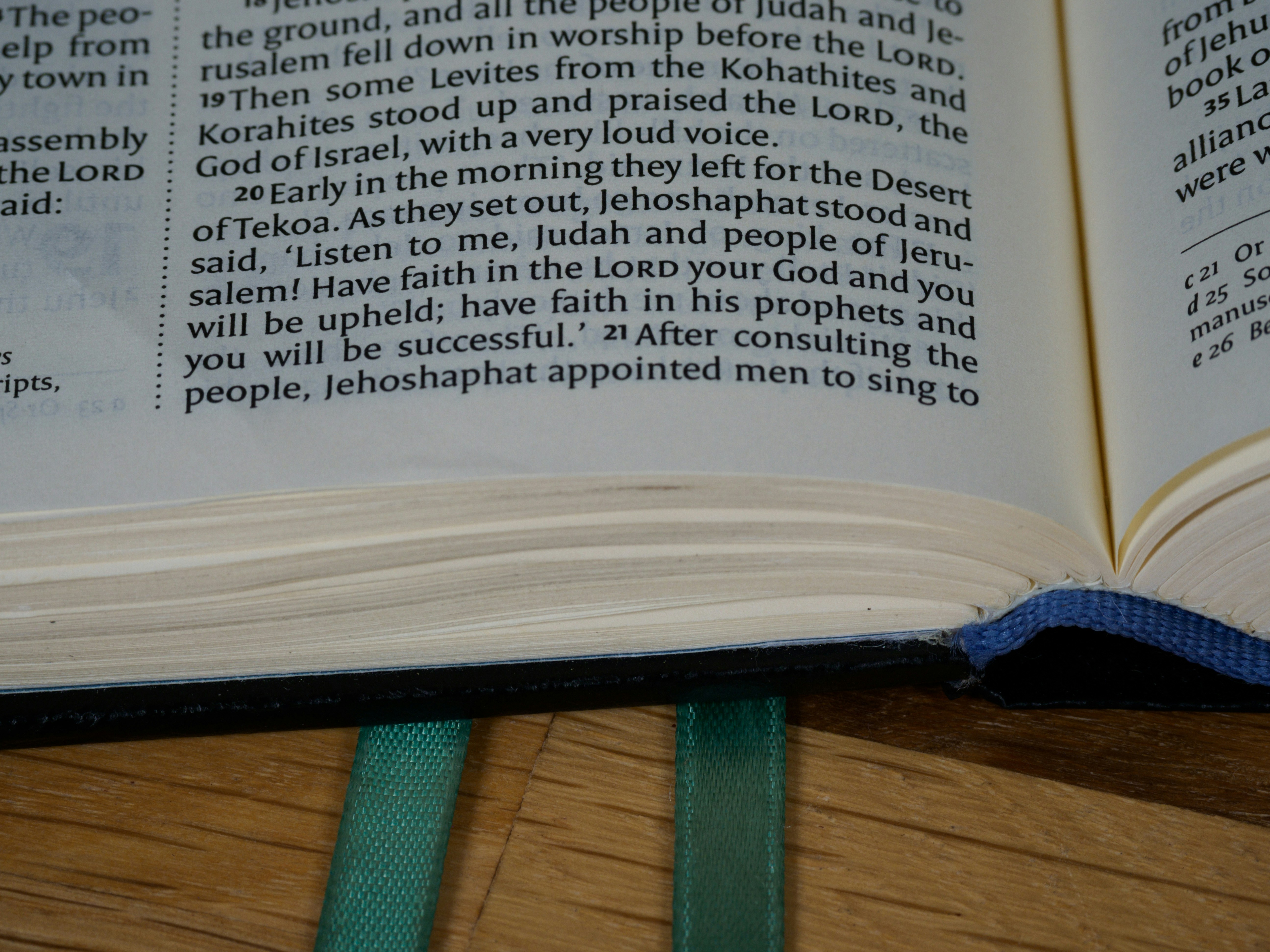 a close up of an open book on a table