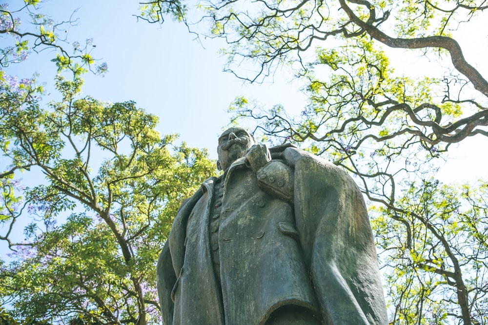 a statue of a man holding a child in his arms