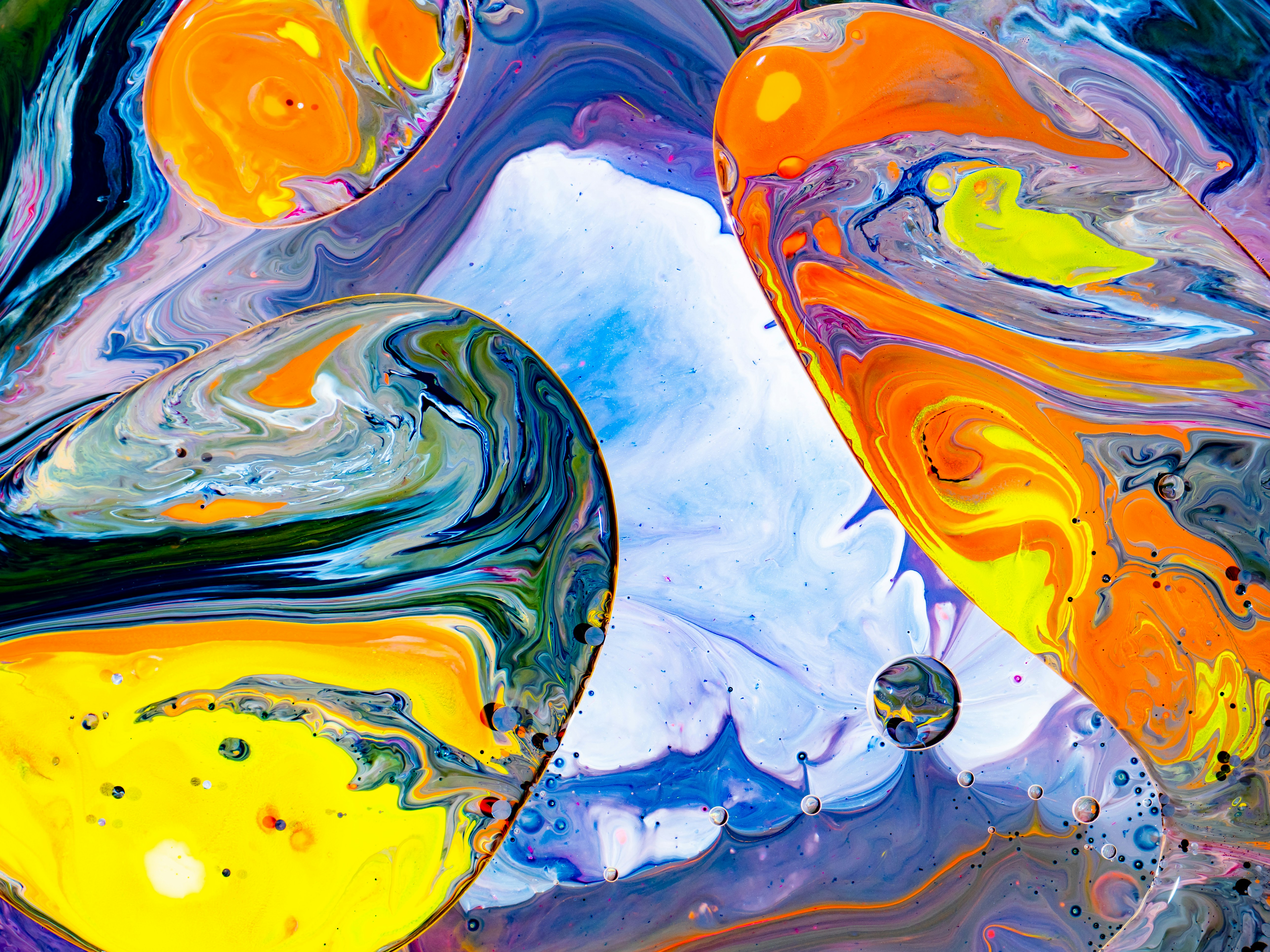 An abstract painting of yellow, blue, and purple swirls photo Free Art Image on Unsplash