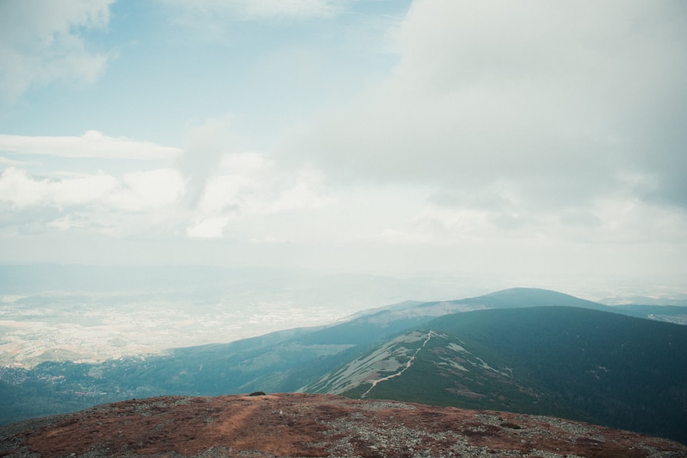 a person standing on top of a mountain