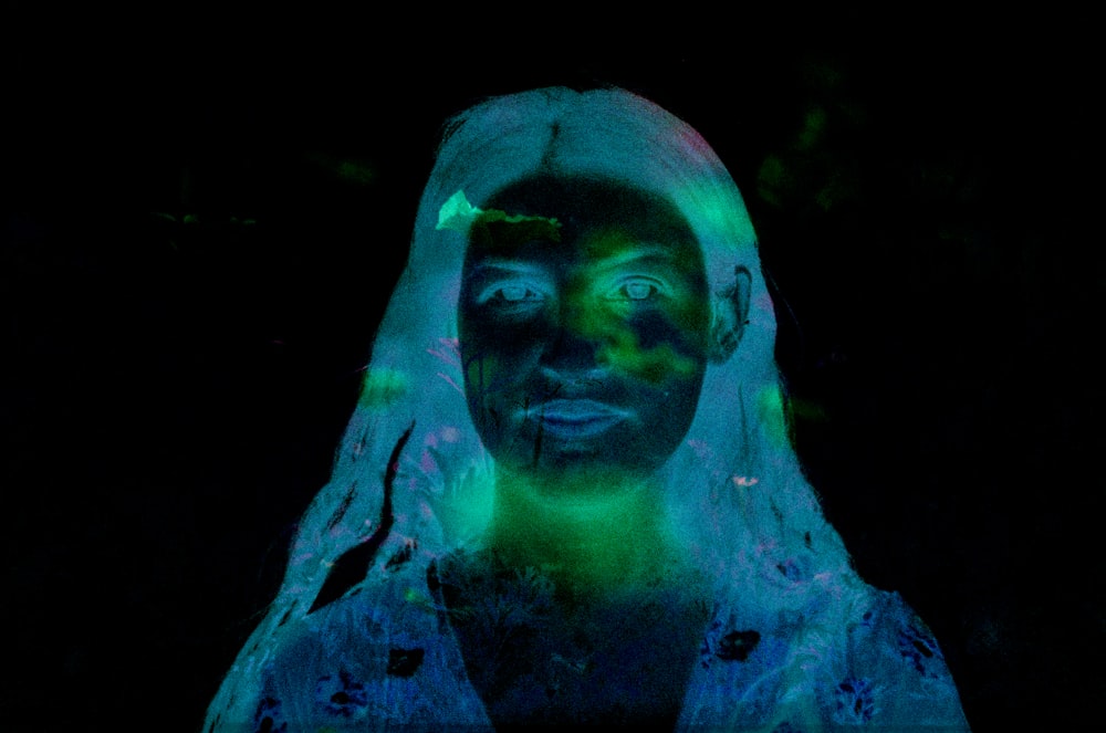 a woman with a glowing face and veil