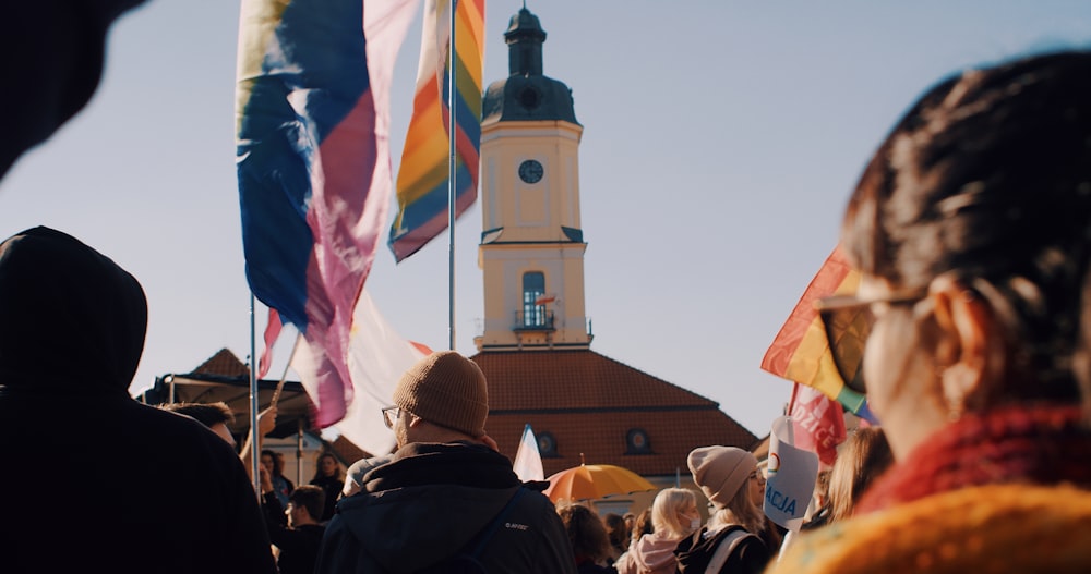 a group of people standing in front of a church