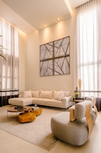 a living room with a couch a chair and a table