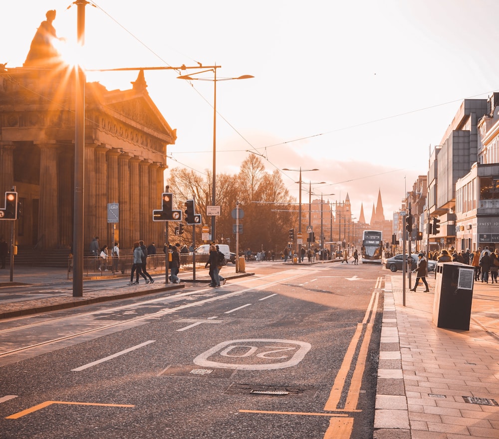 a city street with people walking and riding bikes