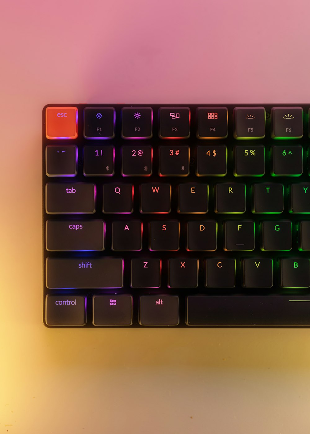 a black keyboard with red and green keys