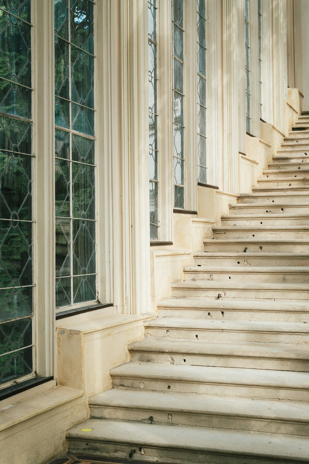 a set of stairs leading up to a window