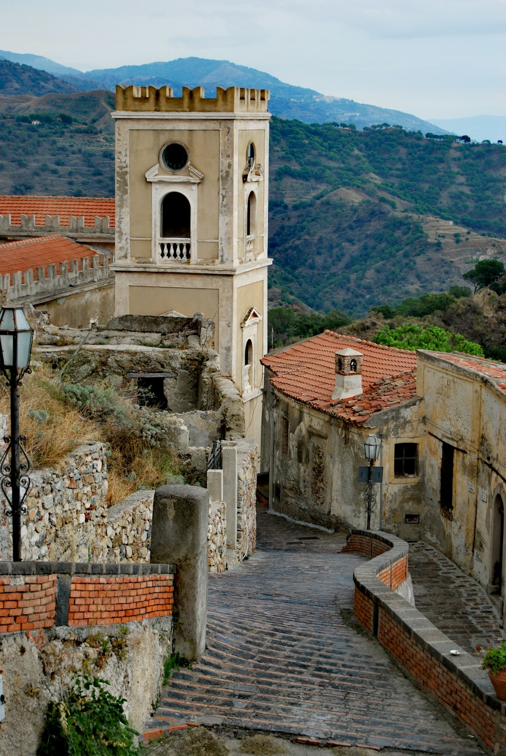 an old building with a clock tower on top of it