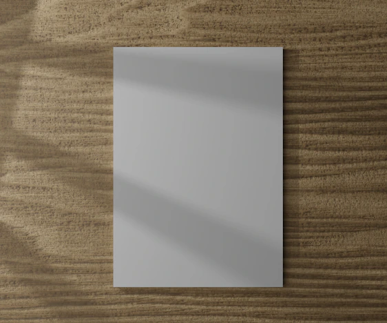 A mysterious blank white page with subtle shadows suggesting hidden stories.
