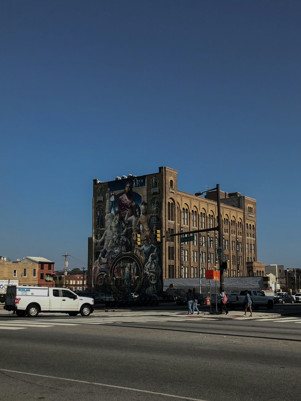 a large building with a mural on the side of it