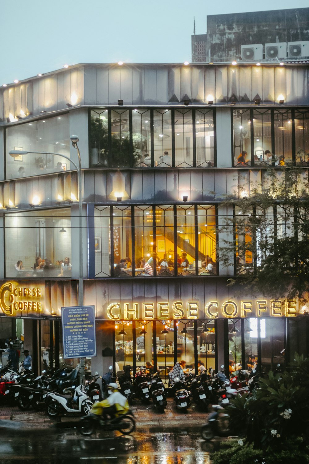 a group of motorcycles parked in front of a building