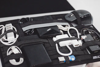 a black case filled with electronics and cords