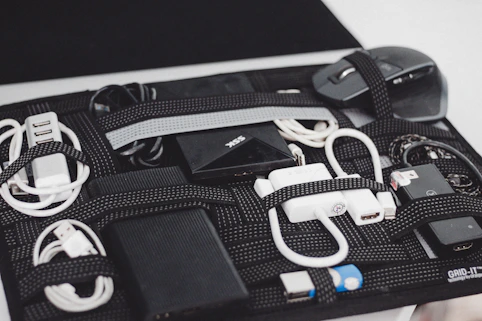 a black case filled with electronics and cords