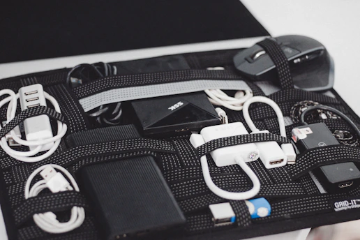 a black case filled with electronics and cords