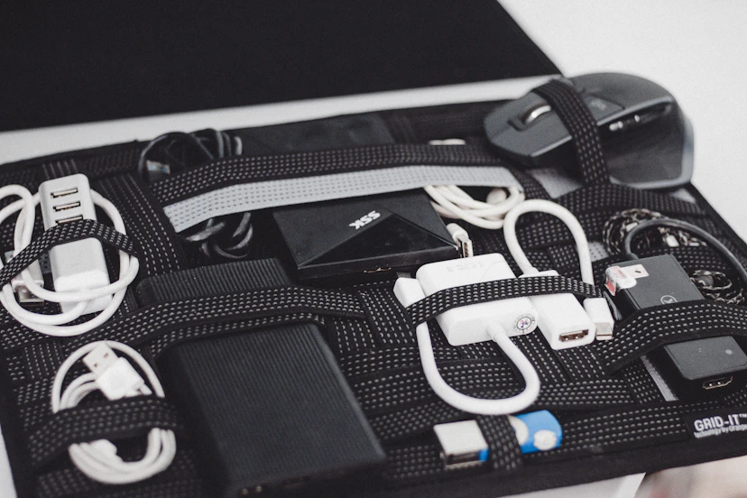 a black case filled with electronics and cords