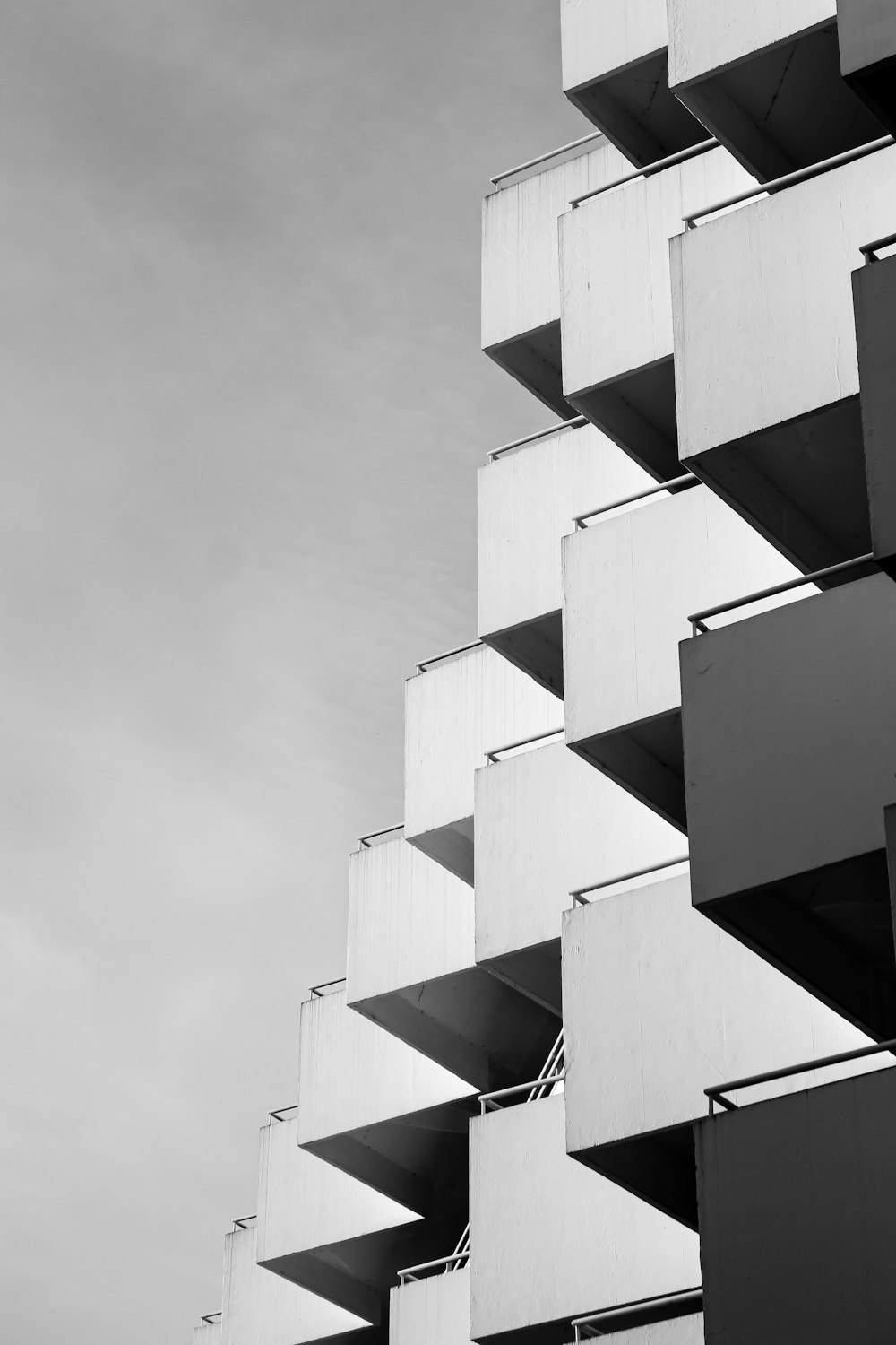 a black and white photo of a tall building