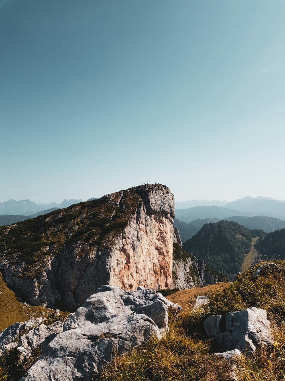 a person standing on top of a mountain