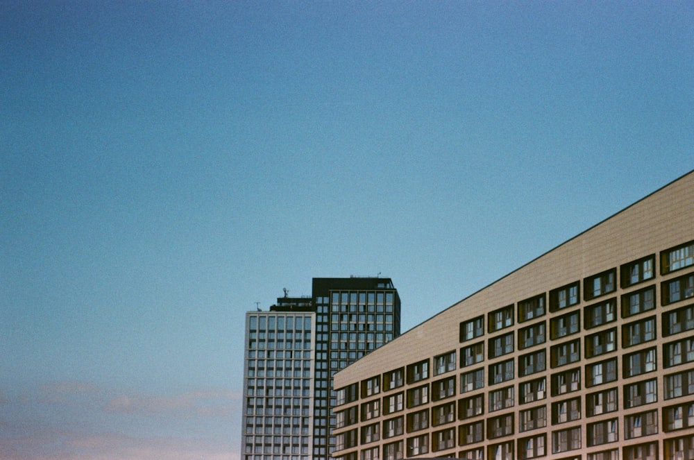 a tall building with a clock on the top of it