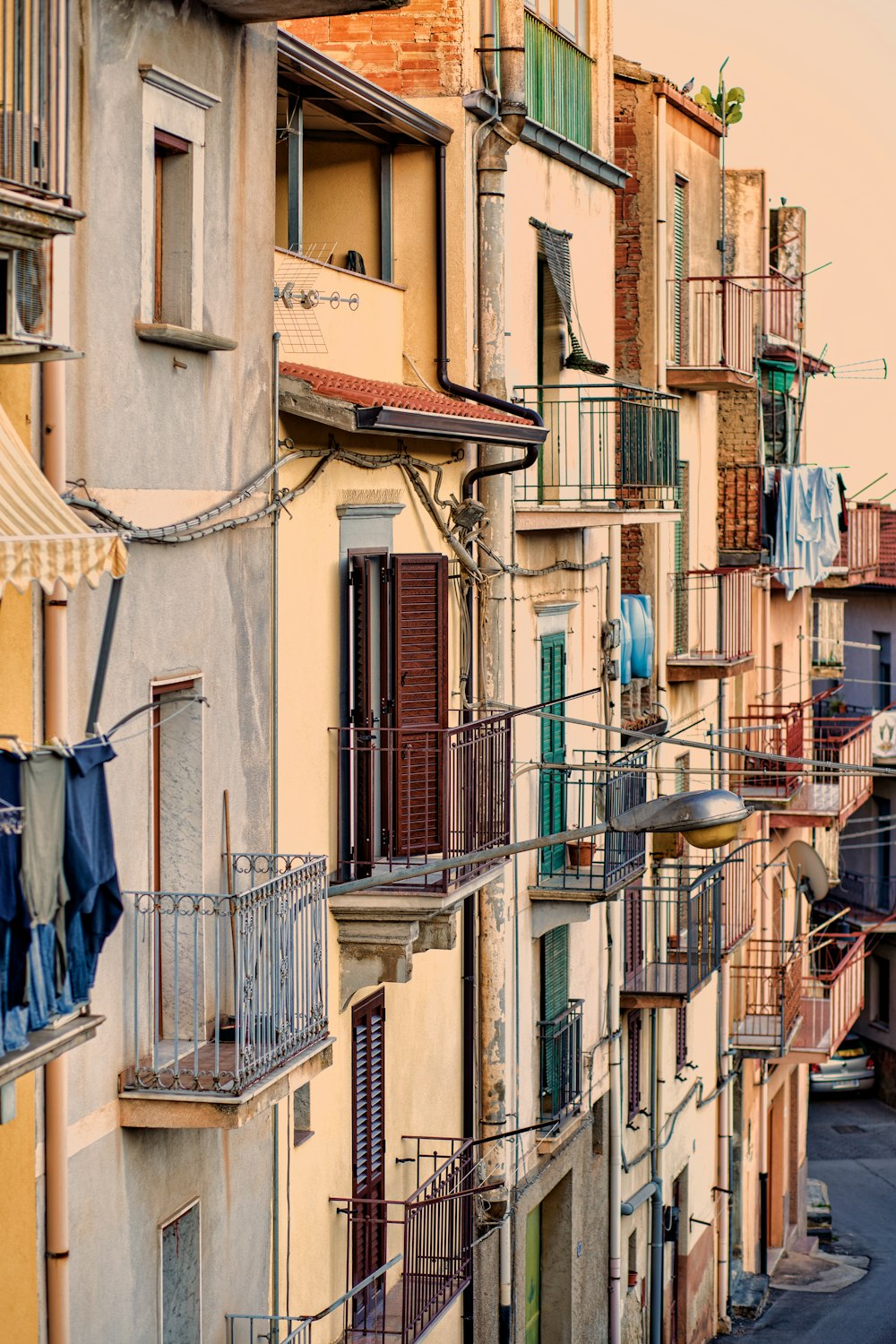 a row of buildings with balconies and balconies on them