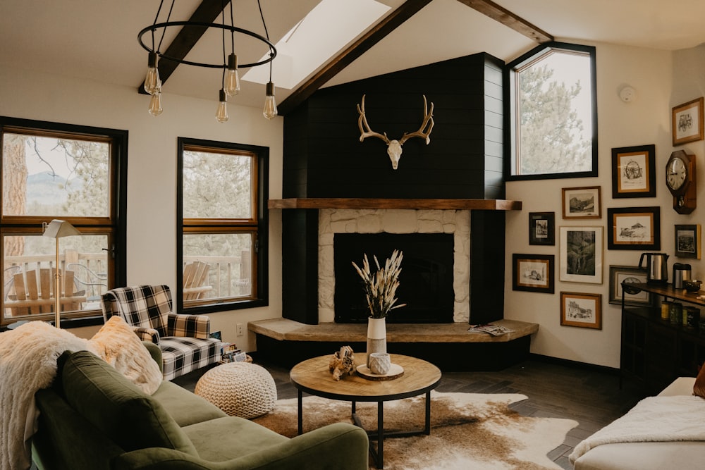 a living room filled with furniture and a fire place