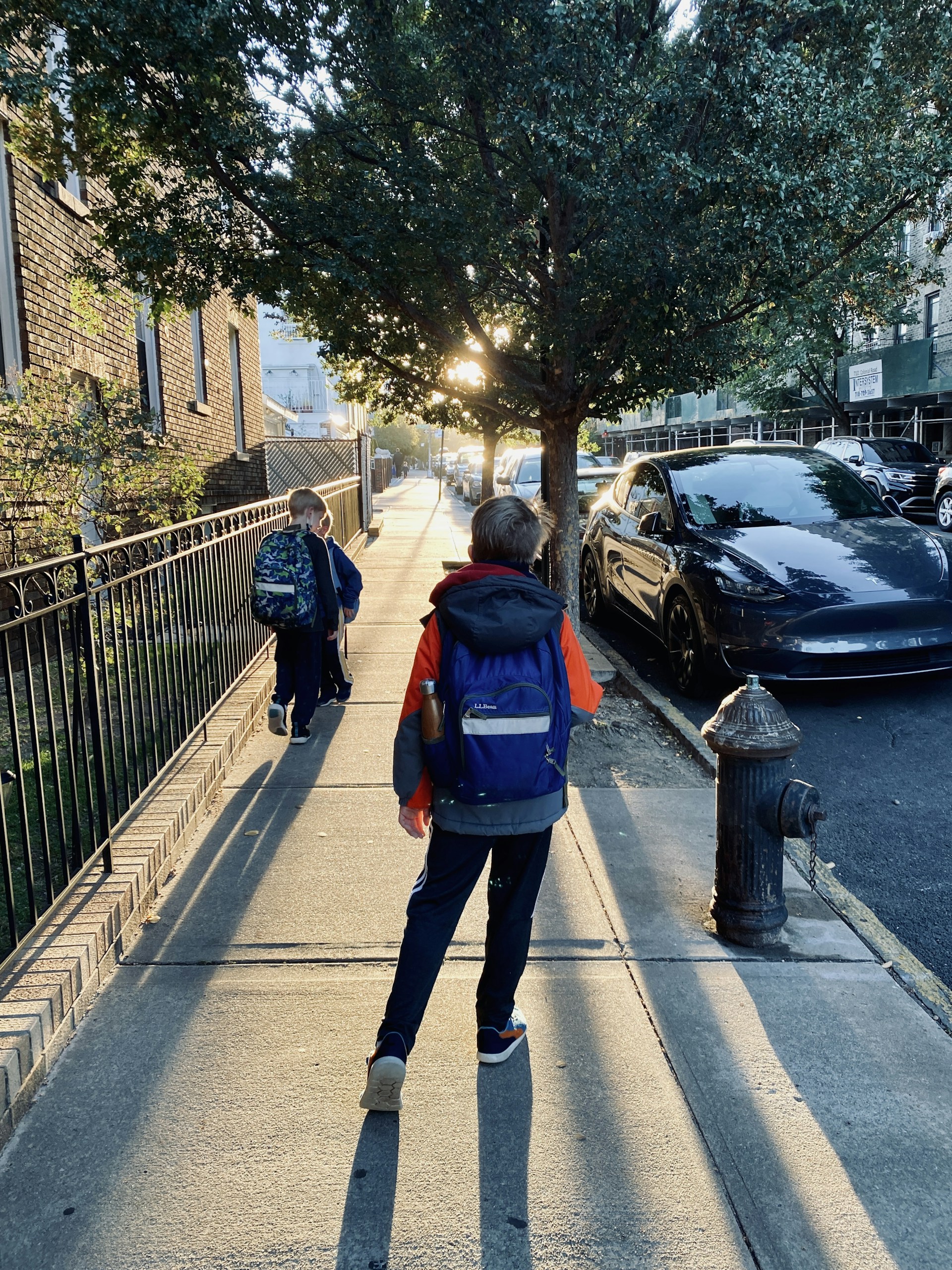 woman wearing yellow long-sleeved dress under white clouds and blue sky during daytime