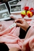 a person holding a baby's name tag in their hand