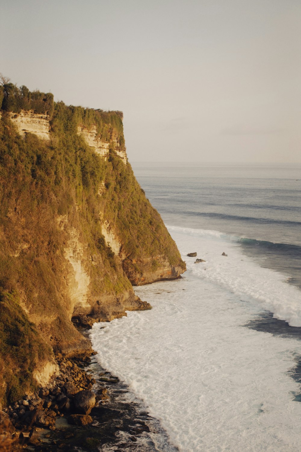 a view of the ocean from a cliff