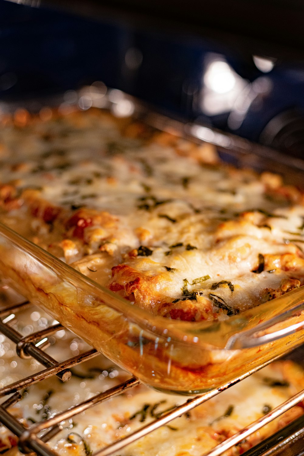 a casserole dish is being cooked in the oven