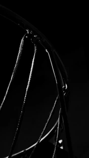 Close-up of high-quality basketball hoop and net on a sleek court