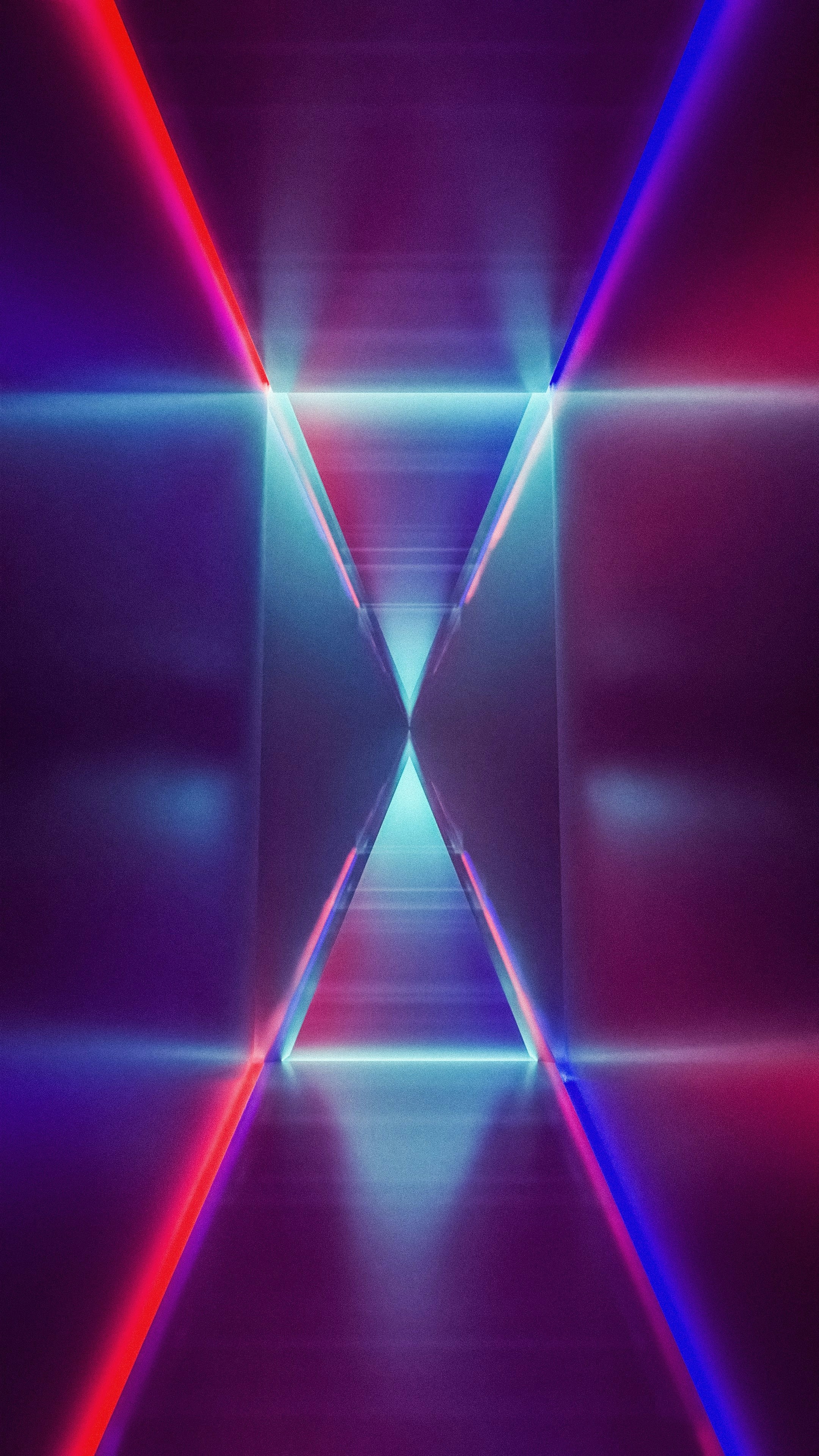 an abstract image of a purple and red light