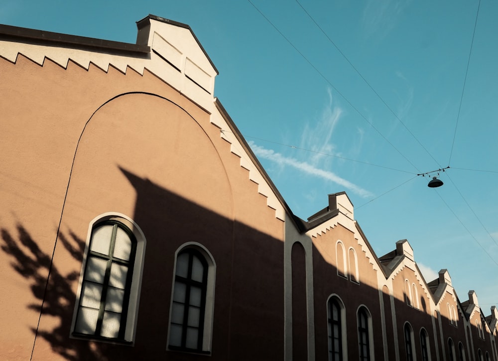 a row of buildings with a sky background