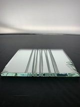 A friendly customer service representative ready to assist with custom glass orders.