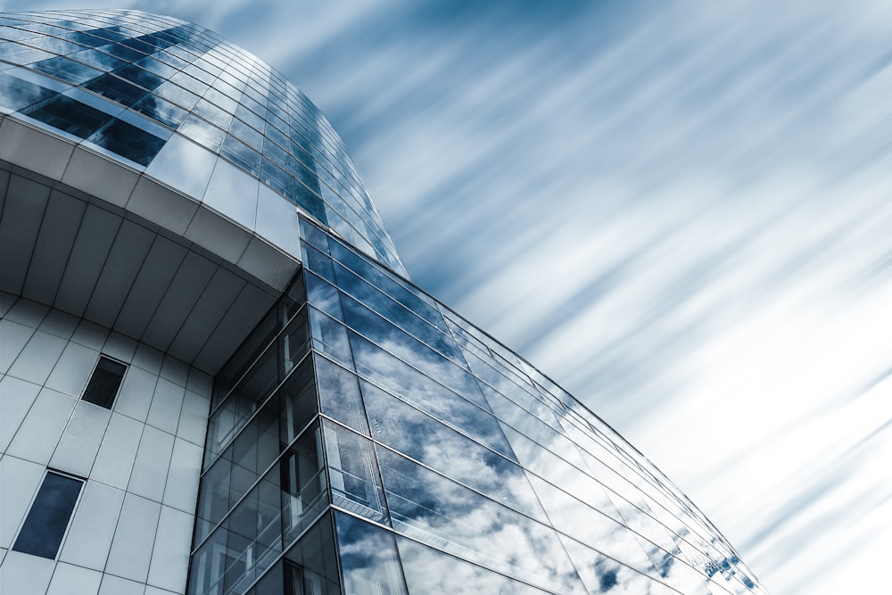 a very tall building with a sky background