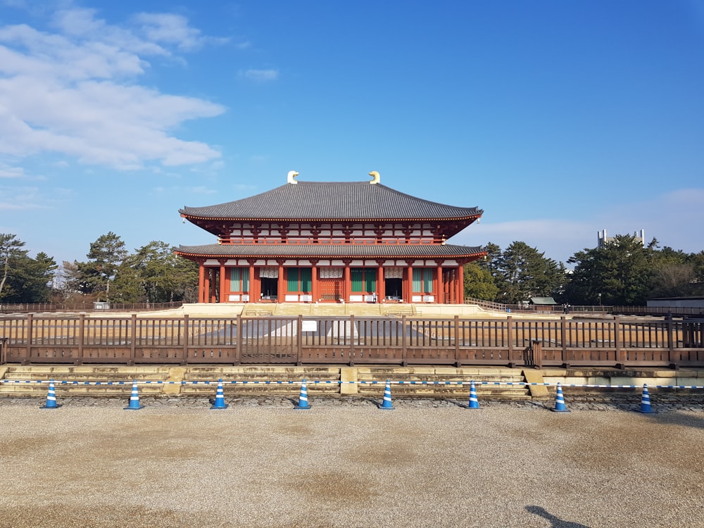 a tall building with a fence around it