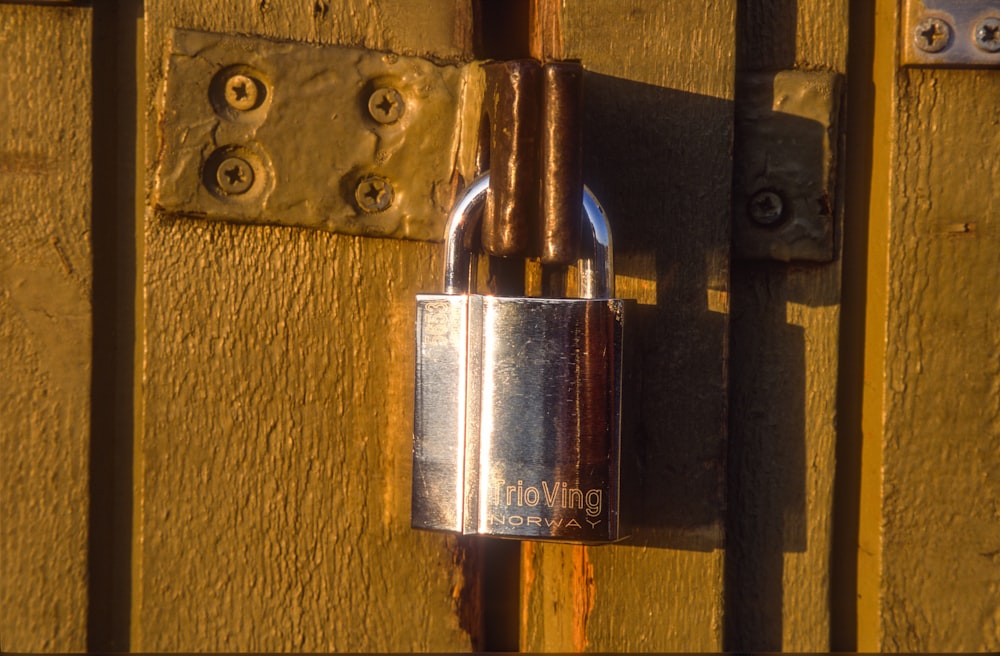 a close up of a padlock on a door